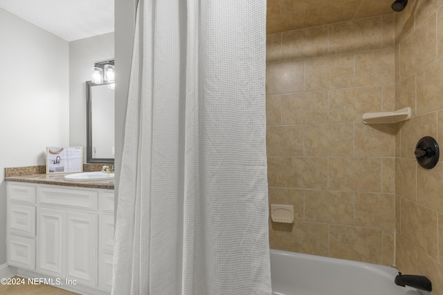 bathroom with vanity and shower / bathtub combination with curtain