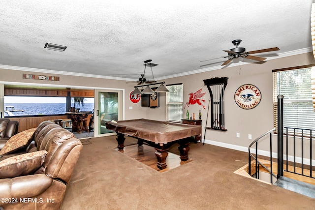 game room with pool table, crown molding, carpet, and ceiling fan