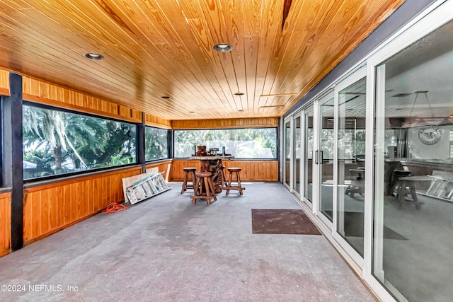 sunroom / solarium with wood ceiling