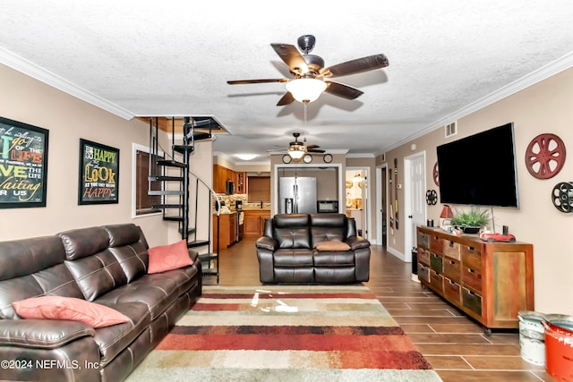 living room featuring crown molding, hardwood / wood-style floors, a textured ceiling, and ceiling fan