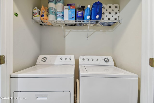 laundry room with washing machine and dryer