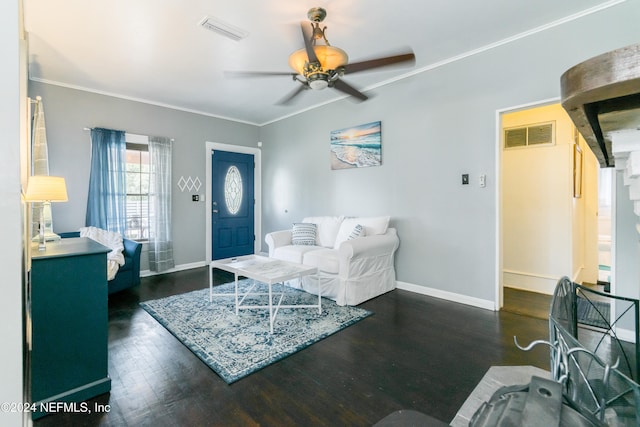 living room with ceiling fan, crown molding, and dark hardwood / wood-style flooring