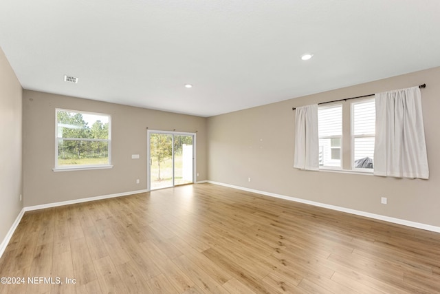 7716 Merchants Way, Jacksonville, FL 32222 - unfurnished room featuring baseboards, visible vents, light wood-style flooring, and recessed lighting