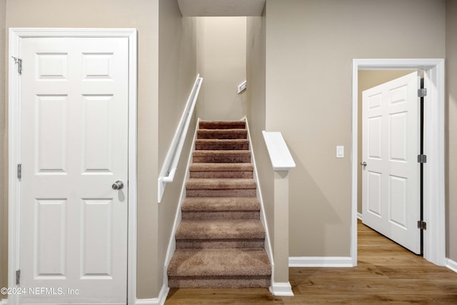 7716 Merchants Way, Jacksonville, FL 32222 - stairway with wood finished floors and baseboards