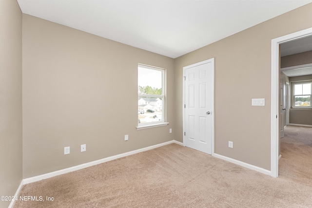 7716 Merchants Way, Jacksonville, FL 32222 - unfurnished bedroom featuring carpet flooring and baseboards