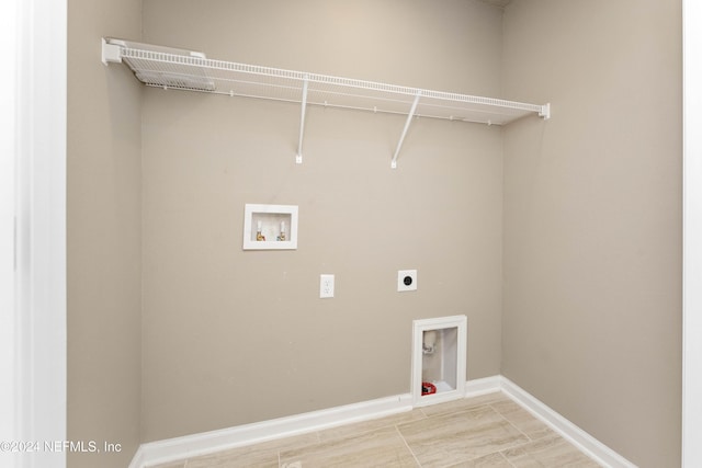 7716 Merchants Way, Jacksonville, FL 32222 - washroom with baseboards, washer hookup, laundry area, and hookup for an electric dryer