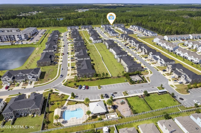 7716 Merchants Way, Jacksonville, FL 32222 - birds eye view of property with a wooded view and a water view