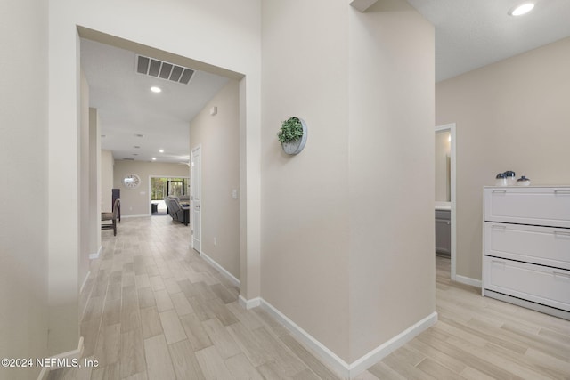 hallway featuring light hardwood / wood-style floors