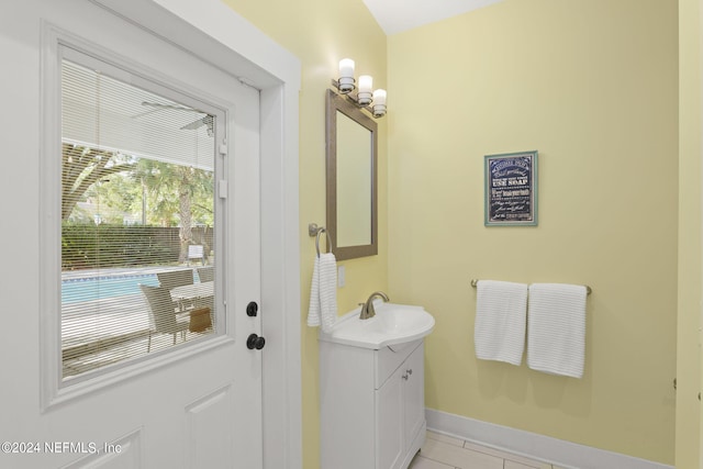 bathroom with vanity and tile patterned flooring