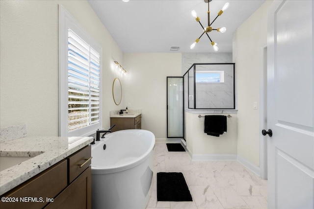 bathroom with plenty of natural light, vanity, and plus walk in shower