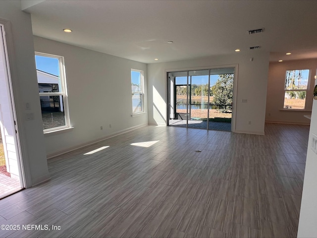 empty room featuring hardwood / wood-style floors