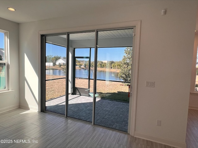 entryway featuring a water view