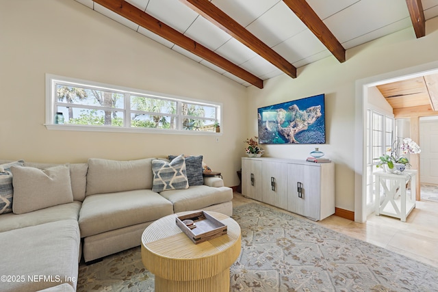 living area featuring vaulted ceiling with beams