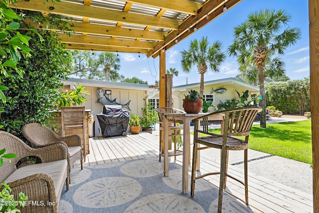 view of patio / terrace featuring a deck and a pergola