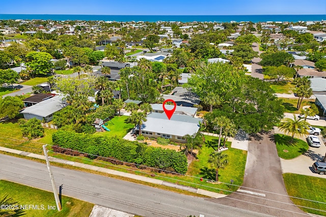 bird's eye view featuring a residential view and a water view