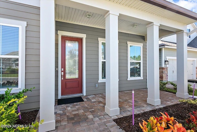 entrance to property with covered porch