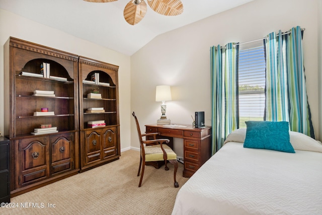 bedroom featuring lofted ceiling and light colored carpet