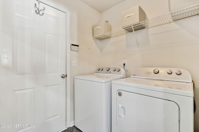 laundry room with washing machine and dryer