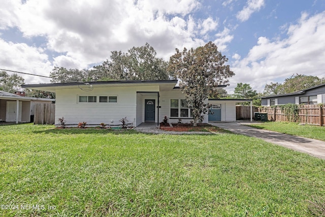 ranch-style house with a front yard