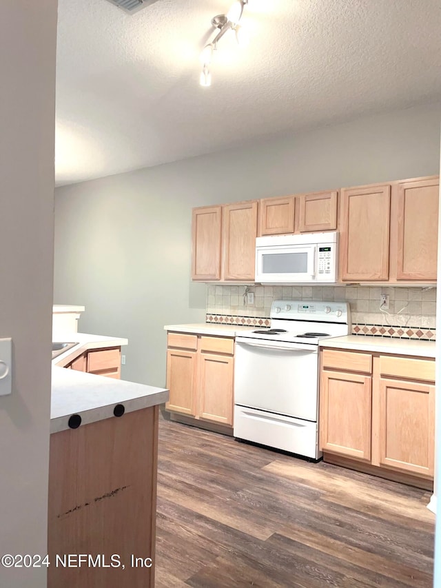 kitchen with white appliances, light brown cabinetry, dark hardwood / wood-style flooring, and tasteful backsplash