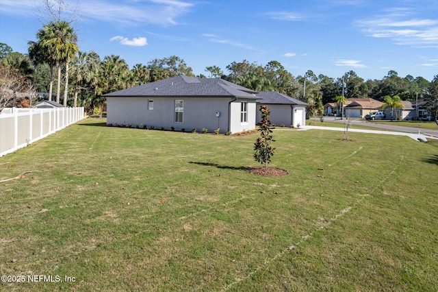 view of yard featuring a garage