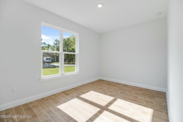 empty room featuring light hardwood / wood-style flooring