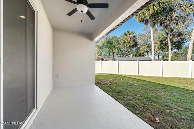 view of yard featuring ceiling fan