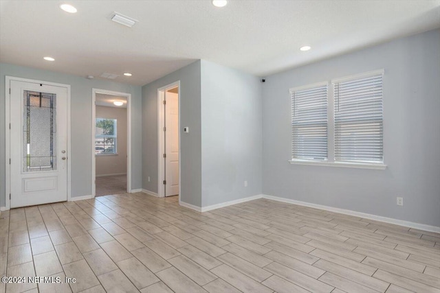 empty room featuring light hardwood / wood-style floors