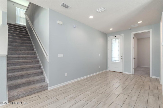 interior space with light hardwood / wood-style flooring