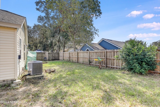 view of yard featuring central AC