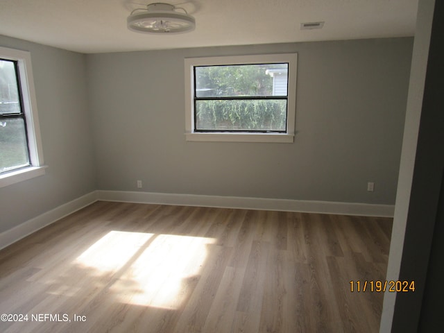 empty room with light wood-type flooring