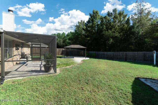 view of yard with a gazebo and a patio area