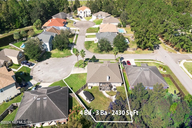 aerial overview of property's location with nearby suburban area