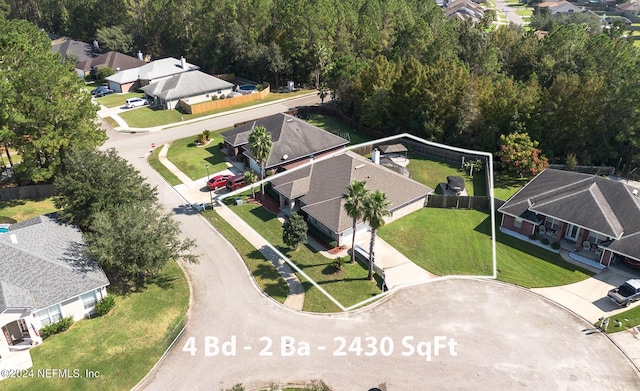 aerial perspective of suburban area featuring property boundaries highlighted