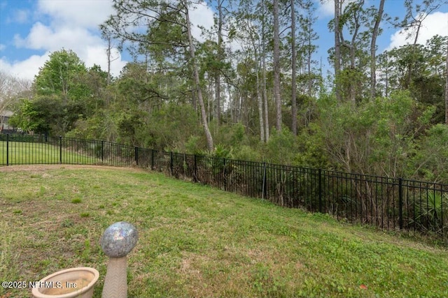 view of yard featuring fence