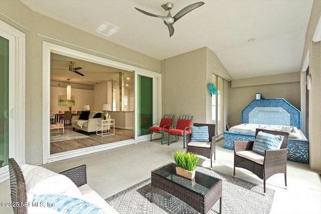 view of patio / terrace featuring an outdoor living space and a ceiling fan