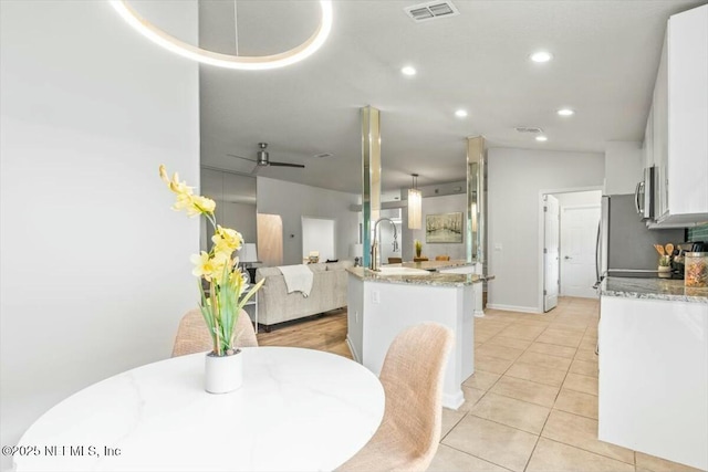 dining area with recessed lighting, visible vents, baseboards, and light tile patterned flooring