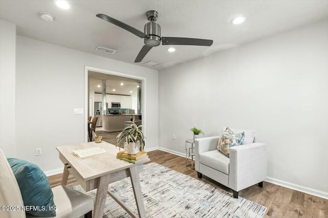 home office featuring recessed lighting, visible vents, wood finished floors, and ceiling fan