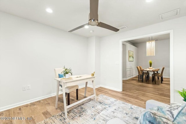 office with recessed lighting, baseboards, wood finished floors, and a ceiling fan