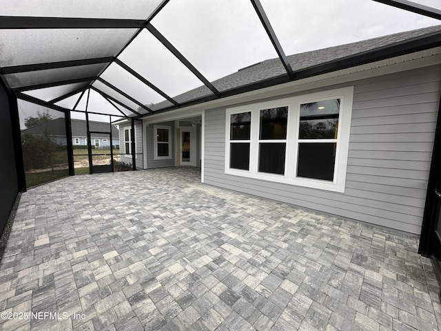 unfurnished sunroom with vaulted ceiling