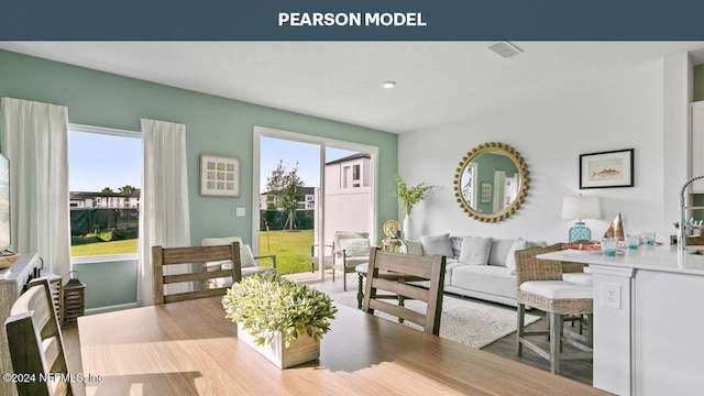 dining room with light hardwood / wood-style flooring