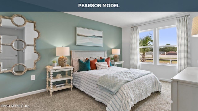 carpeted bedroom with baseboards
