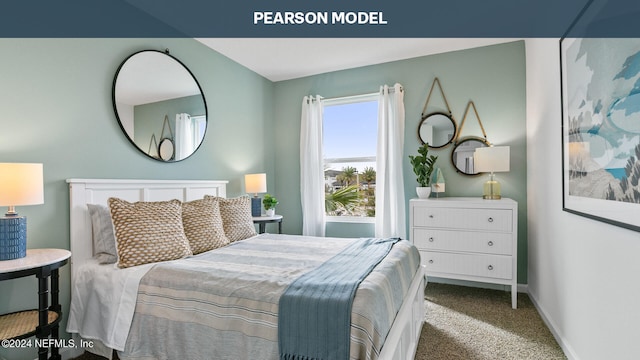 carpeted bedroom featuring baseboards