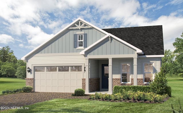 view of front of house with covered porch and a front yard