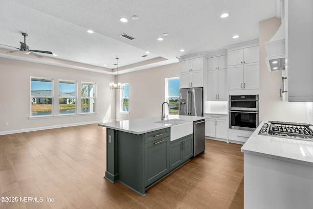 335 Lamego Ln, Saint Augustine, FL 32095 - kitchen with a sink, visible vents, recessed lighting, light countertops, and appliances with stainless steel finishes