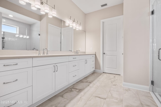 335 Lamego Ln, Saint Augustine, FL 32095 - full bathroom with a shower stall, visible vents, marble finish floor, and a sink