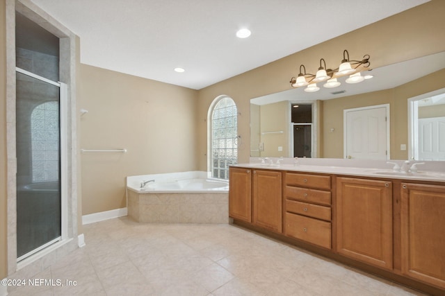 bathroom featuring vanity and plus walk in shower