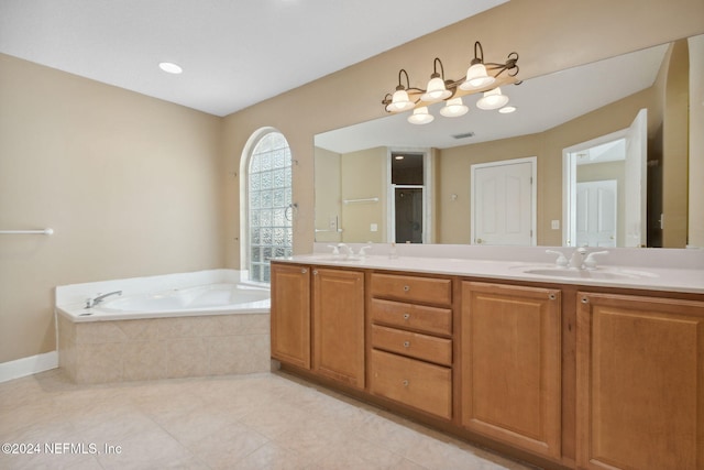 bathroom featuring vanity, shower with separate bathtub, and tile patterned floors