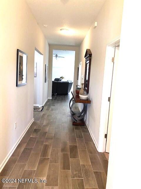 hall featuring dark hardwood / wood-style floors