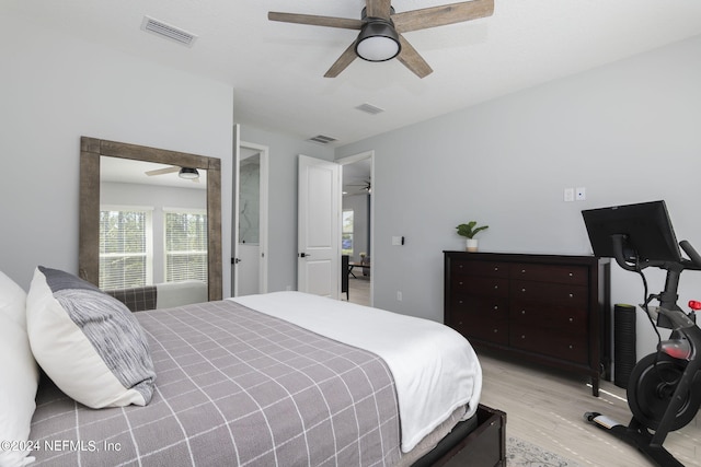 bedroom featuring light wood-type flooring and ceiling fan